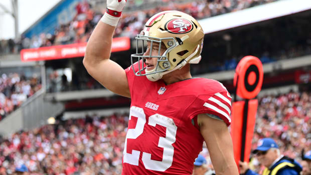 Oct 15, 2023; Cleveland, Ohio, USA; San Francisco 49ers running back Christian McCaffrey (23) celebrates after scoring during the first half against the Cleveland Browns at Cleveland Browns Stadium. Mandatory Credit: Ken Blaze-USA TODAY Sports